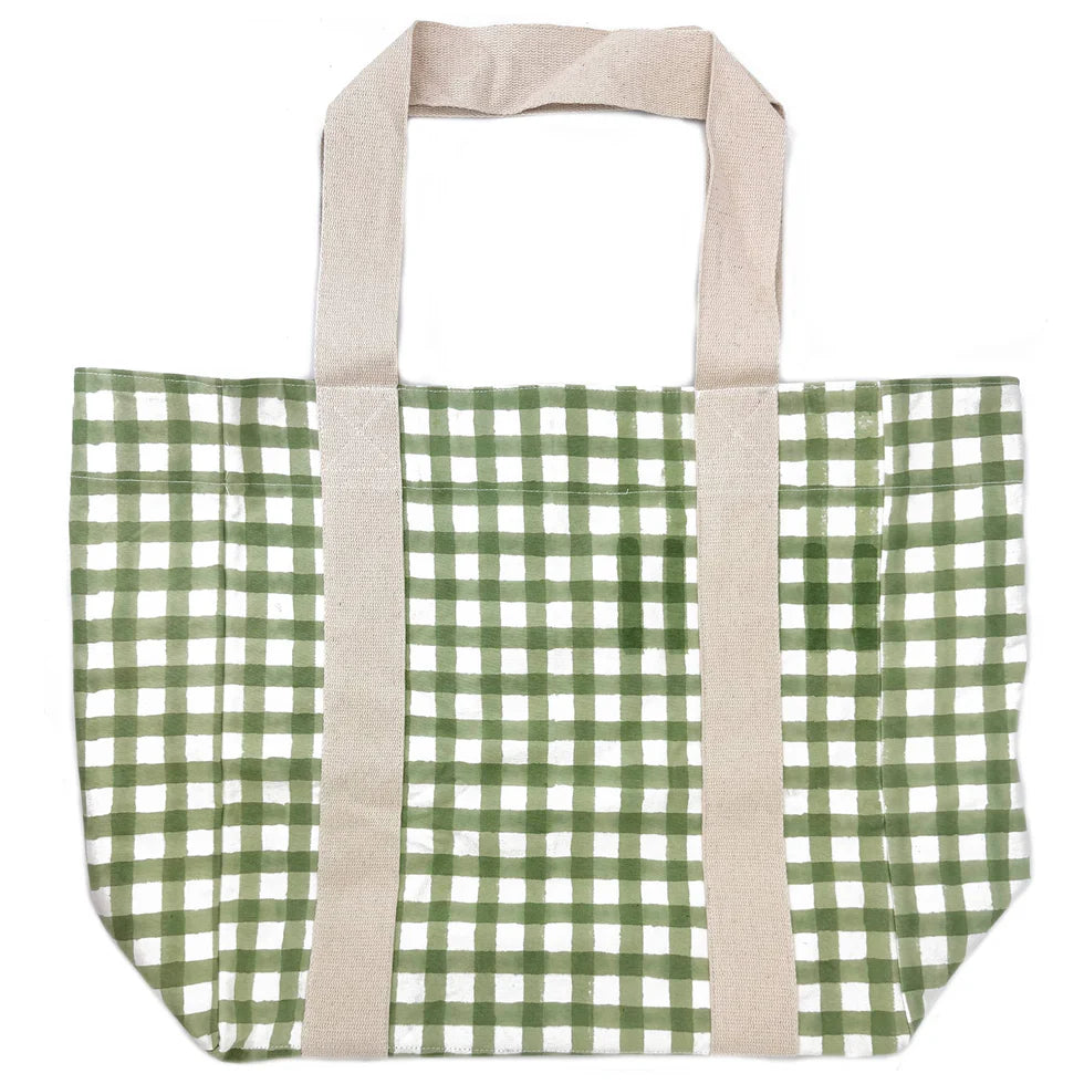 Green and white checkered tote bag with beige handles on a white background