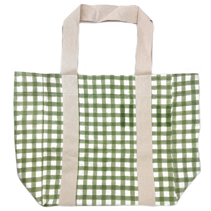 Green and white checkered tote bag with beige handles on a white background