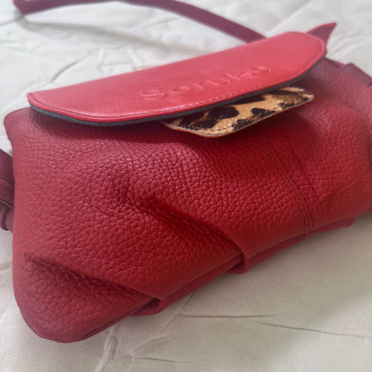 bottom view of berry Gianna Crossbody Purse