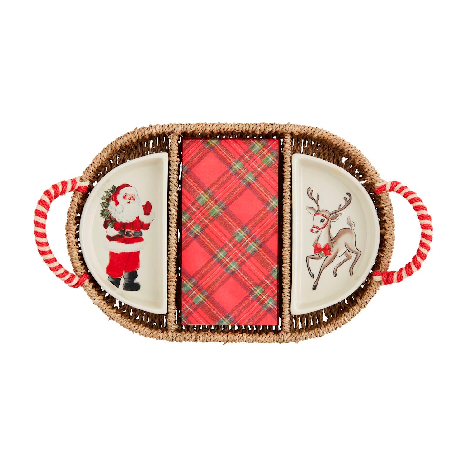 seagrass basket with santa and reindeer dish and plaid napkins in it shown on a white background.