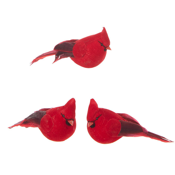 3 felt red cardinals with clips on the bottom.