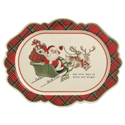 Decorative plate with Santa Claus and reindeer design in a plaid border