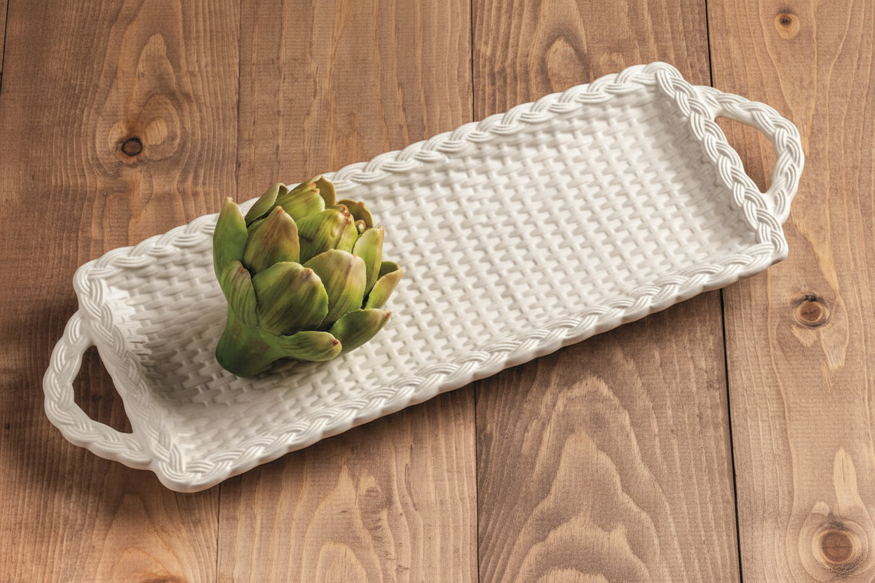 white woven tray with handles on a wooden surface with an artichoke on it