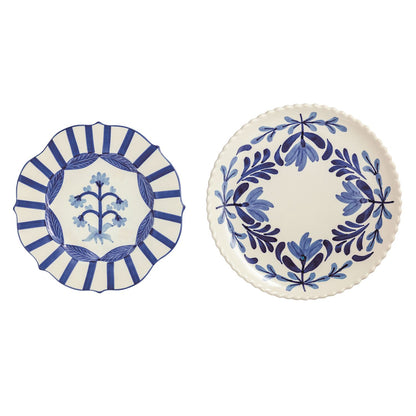 2 round ceramic platters with blue flower designs shown on a white background