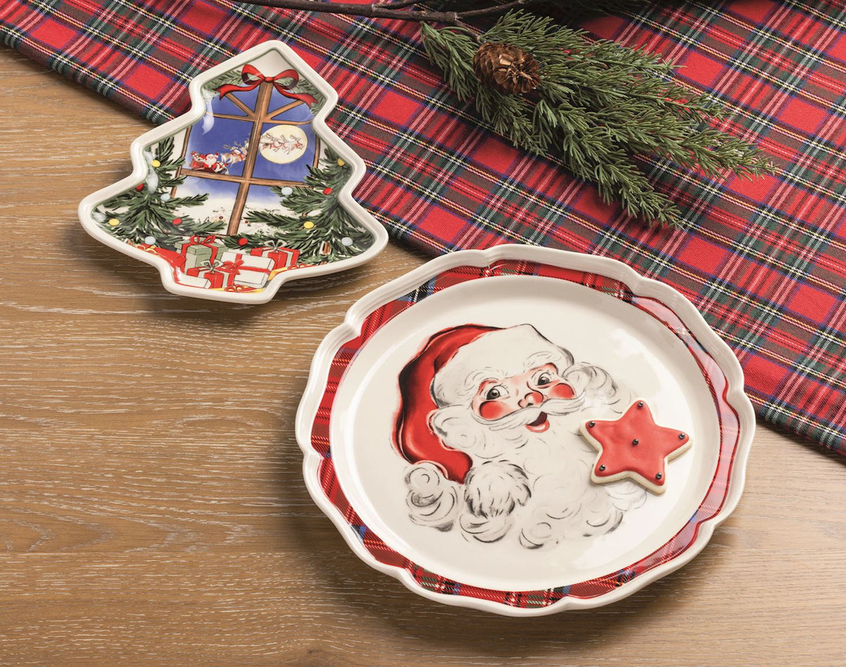 santa and tree platters on a food table