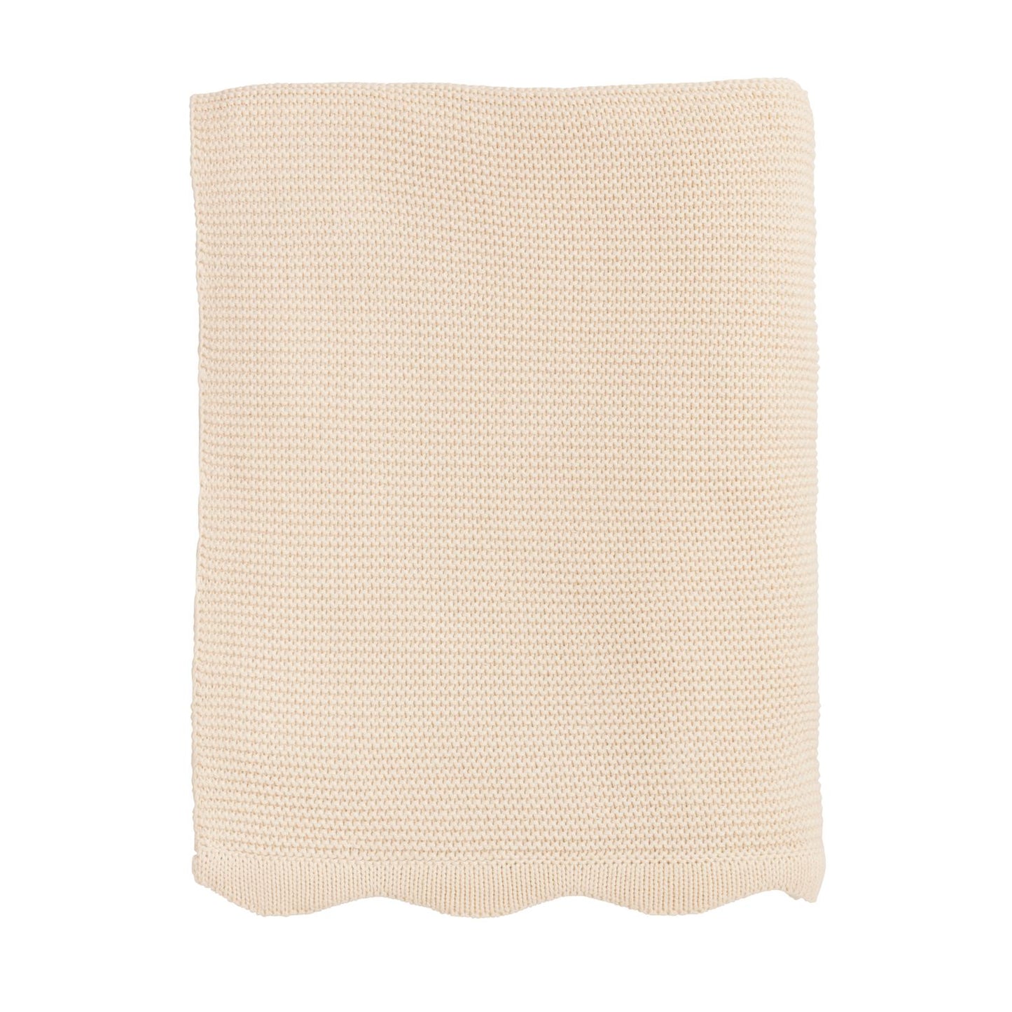 cream colored knitted blanket on a white background