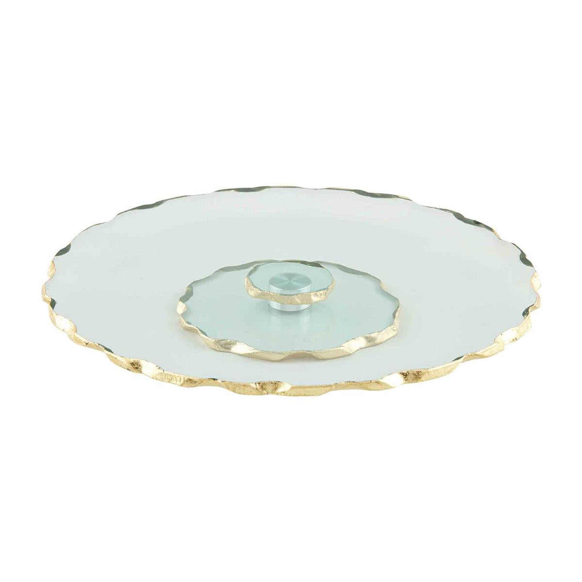 glass and gold lazy Susan shown on a white background.