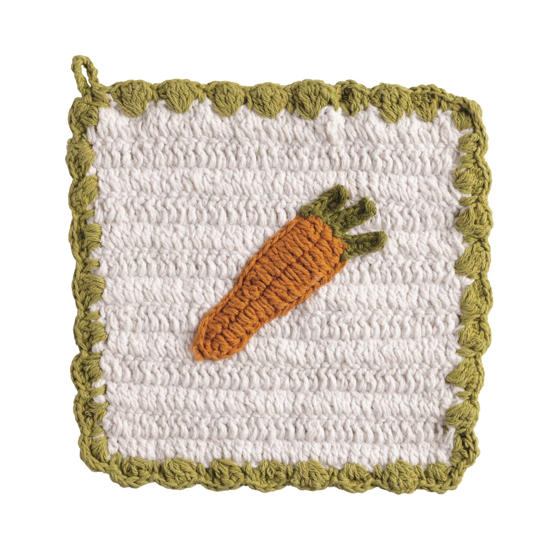 crochet white pot holder trimed in green with an orange carrot in the center