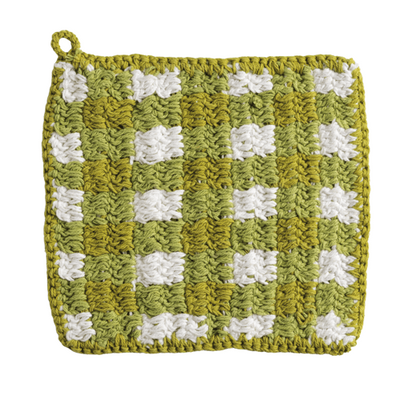 Green and white checkered potholder on a white background