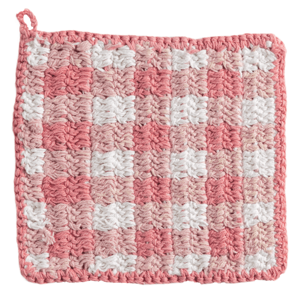 Pink and white checkered potholder on a white background