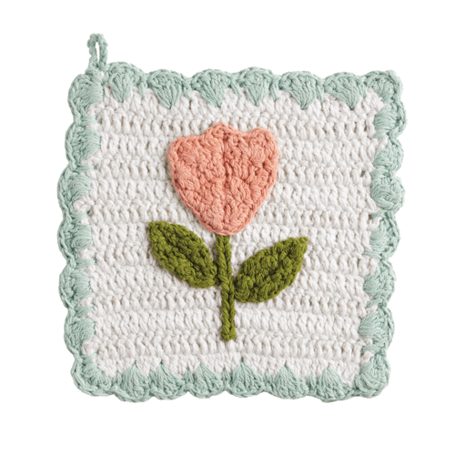 Crocheted pot holder with a pink tulip design on a white background