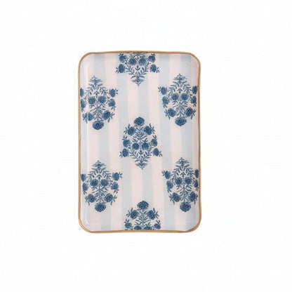 blue and white striped tray with blue floral design and gold rim shown on a white background