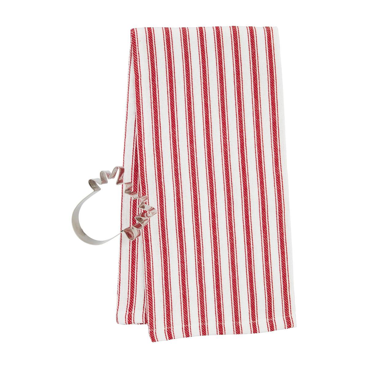 red and white striped towel with a reindeer head shaped cookie cutter set next to it.