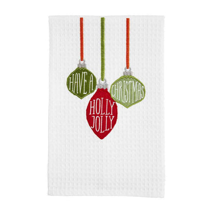 white waffle towel with embroidered ornaments and "have a holly jolly christmas".