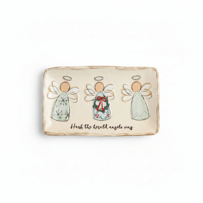 ceramic tray with 3 angels across the center, middle one is holding a holiday wreath, and 'hark the herald angels sing' in script across the bottom