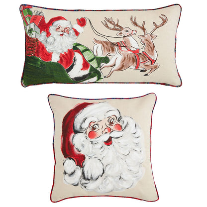 2 styles of painted christmas pillows on a white background.