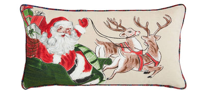 rectangular pillow painted with santa in his sleigh full of gifts pulled by 2 reindeer.