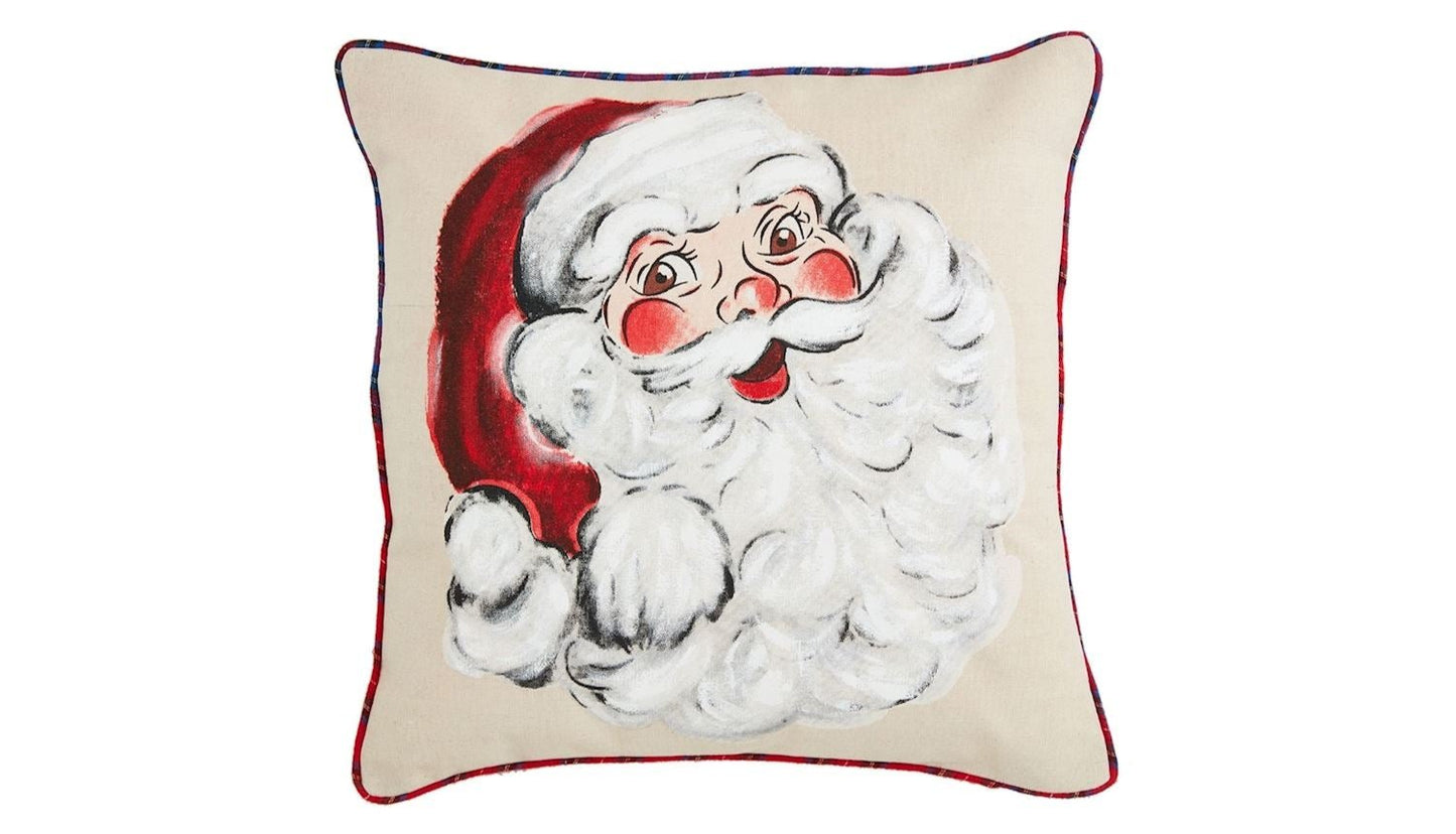 square santa face pillow with tartan piping.