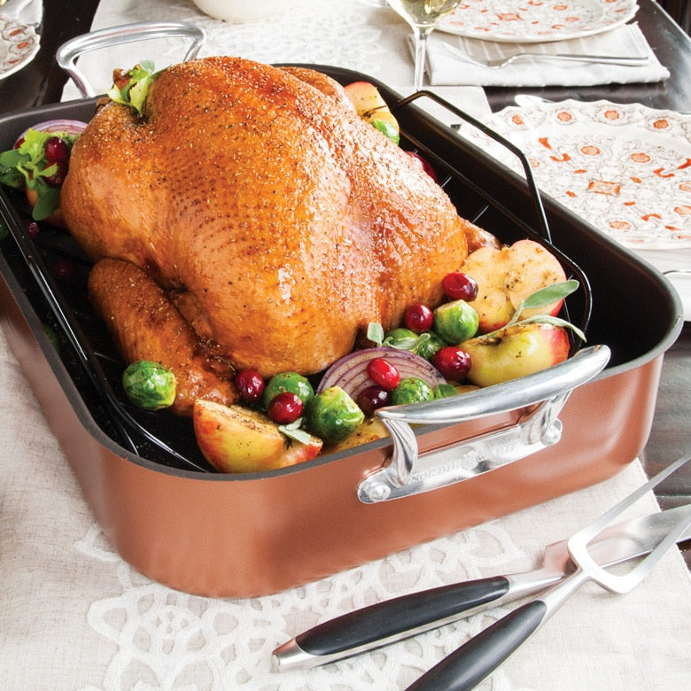 Extra Large Copper Roaster with cooked turkey in it