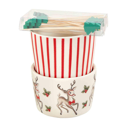 Sleigh vintage christmas ramekin and toothpicks with green trees at the end and displayed against a white background