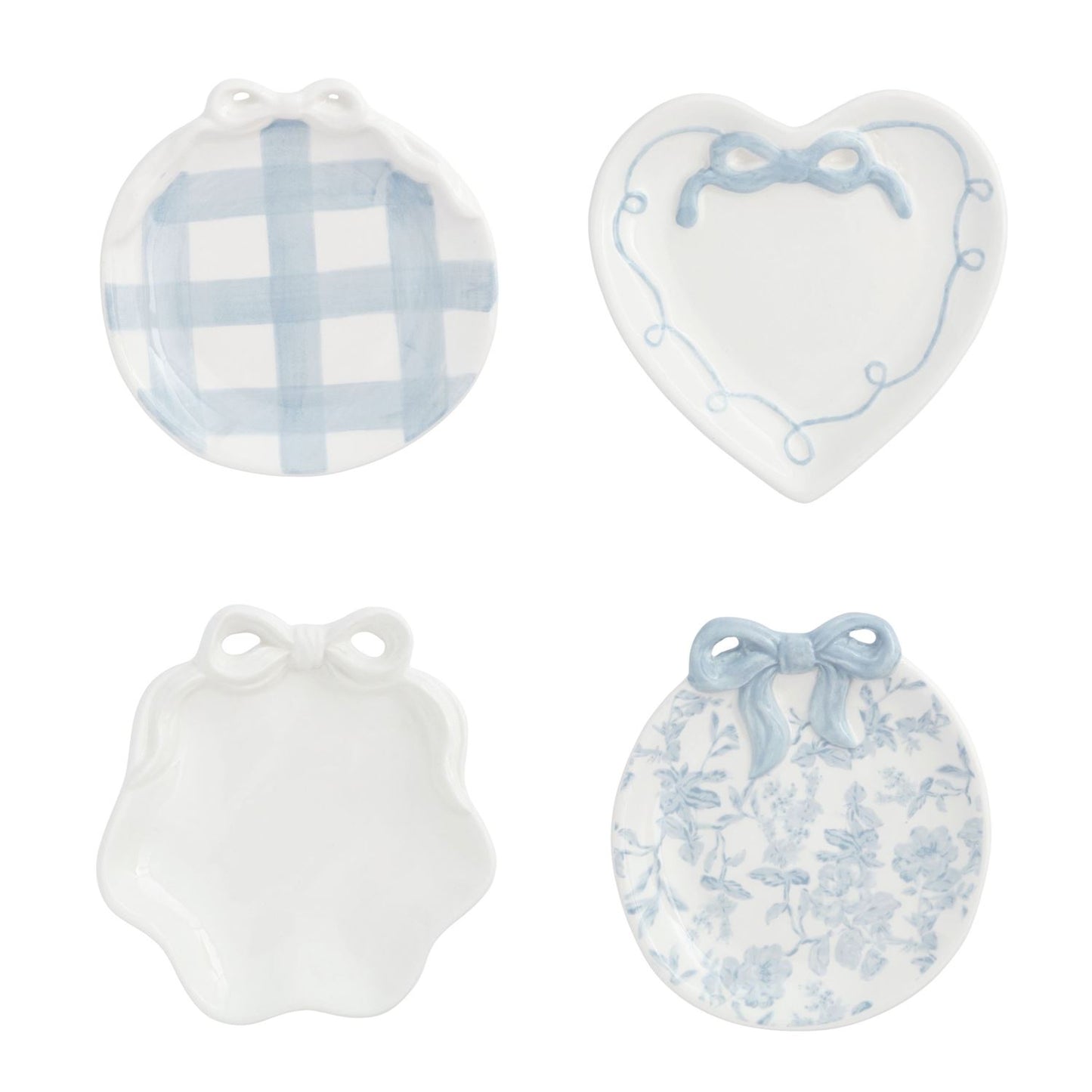 4 assorted blue and white small dishes on a white background