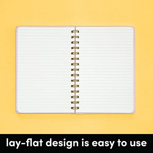 notebook open to show lined pages