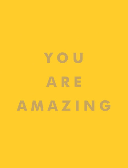 Motivational quote 'YOU ARE AMAZING' on cover of book