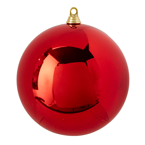 shiny red ball ornament with a gold hoop against a white background