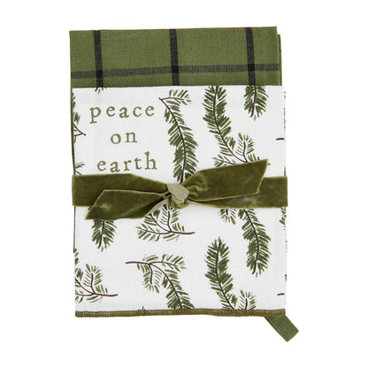 peace on earth white and green christmas towel set displayed against a white background