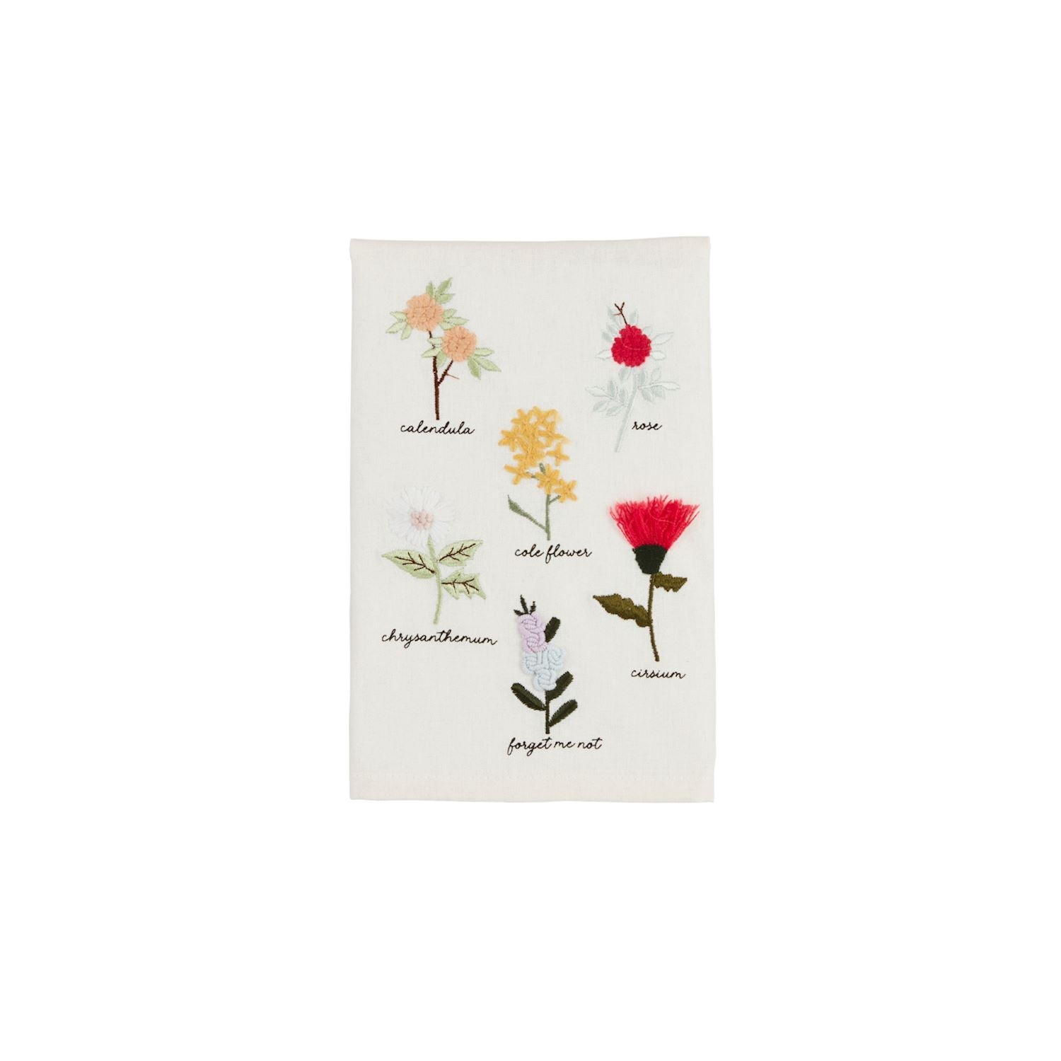 white towel with assorted flowers embroidered on it shown on a white background