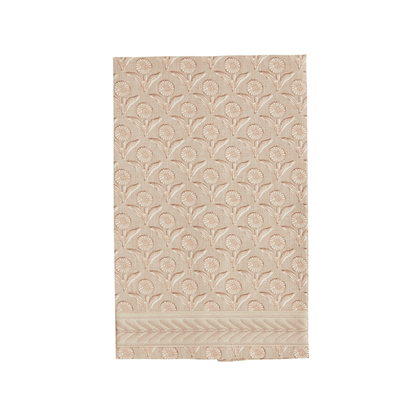 Beige towel  with a geometric floral pattern on a white background