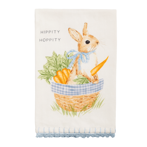 white towel with a bunny and carrots design, blue trim, and "hippity hoppity" text on a white background