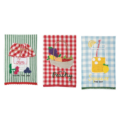 three towels with fruity  crochet elements
