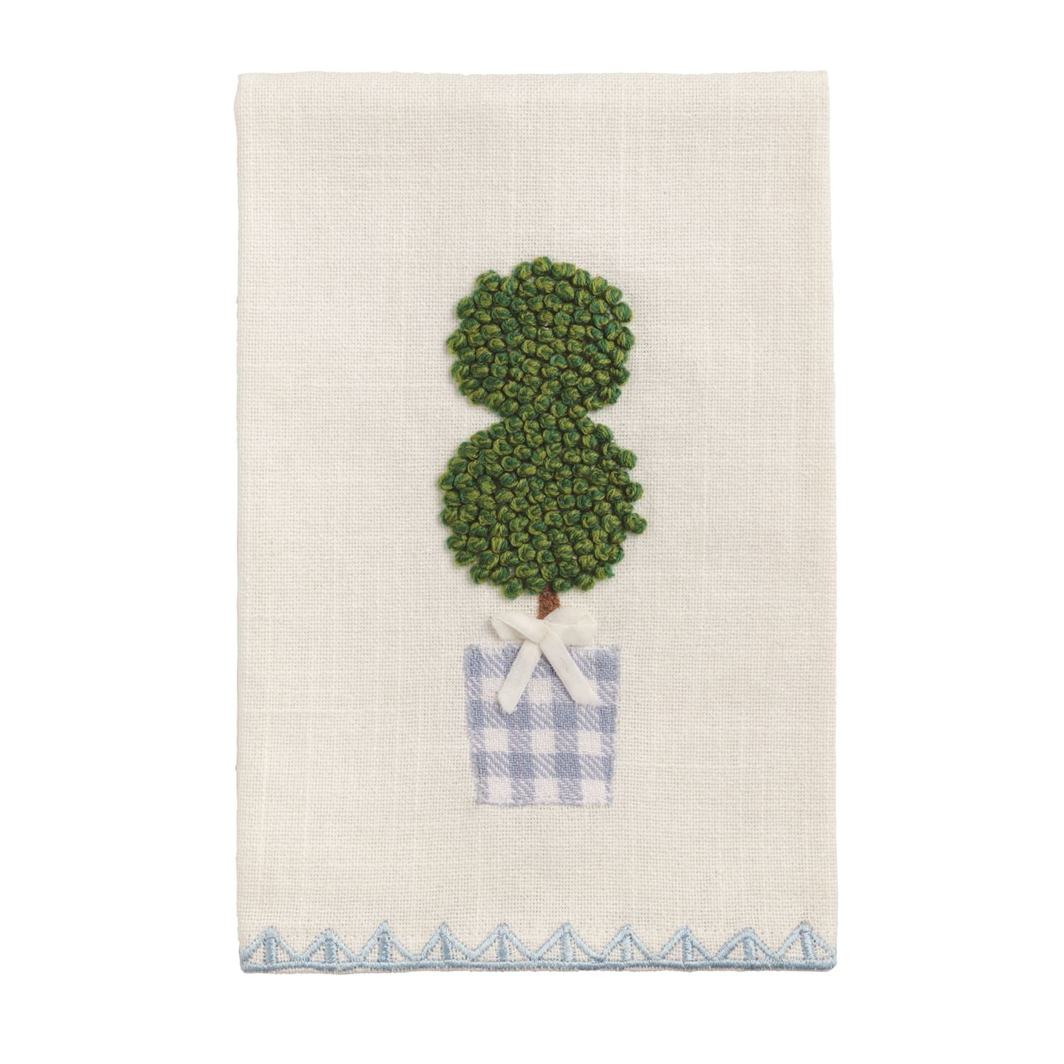 Decorative tea towel with a green topiary design and blue checkered pot on a white background