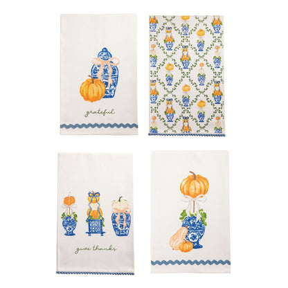 4 assorted tea towels with pumpkin topiary designs shown on a white background