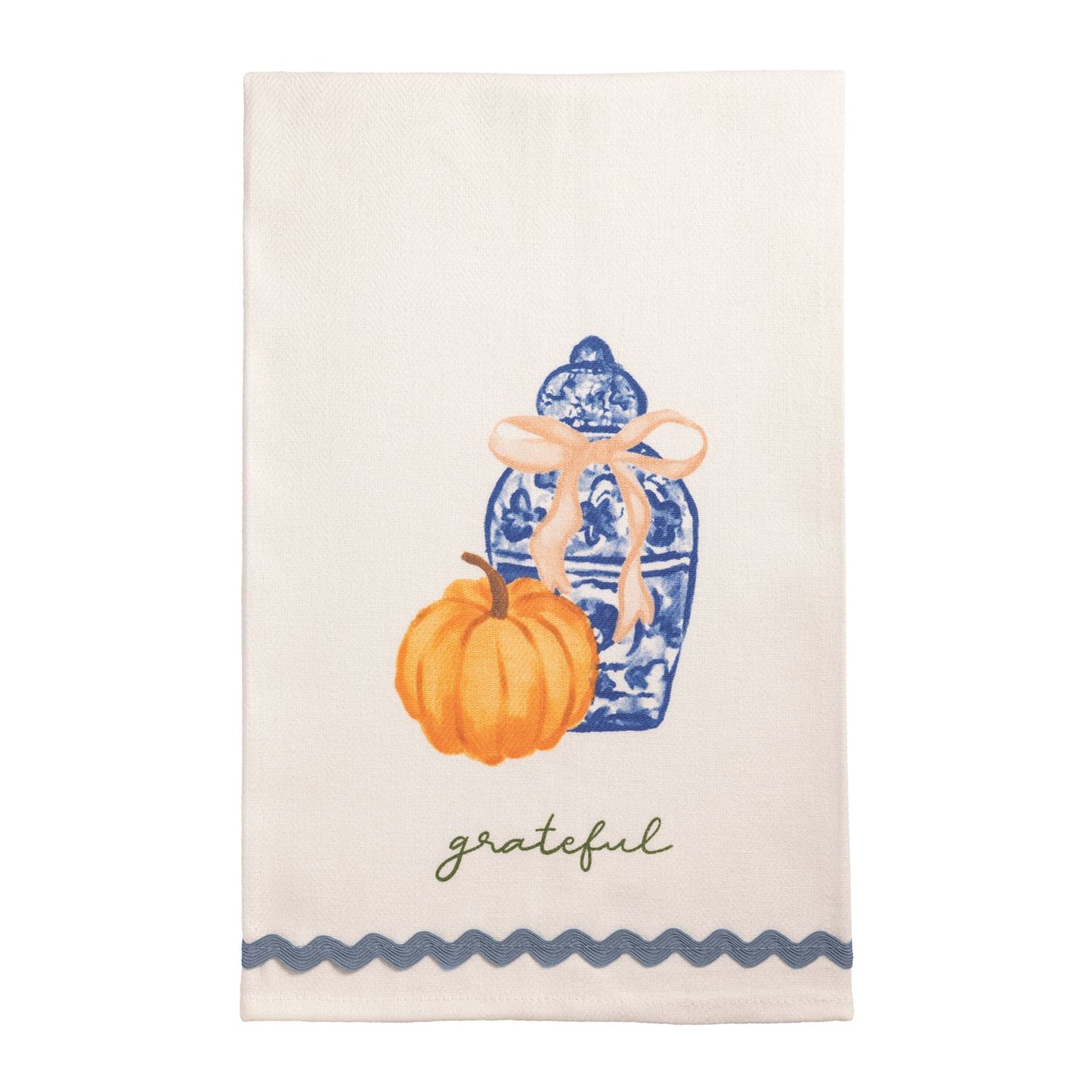 Grateful Topiary Towel with a blue and white ginger jar and orange pumpkin design. "grateful" in printed in script across the bottom above a blue ric-rac trim
