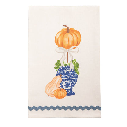 Pumpkin Topiary Towel with deign of a blue and white vase holding a pumpkin and 2 more pumpkins set at its base