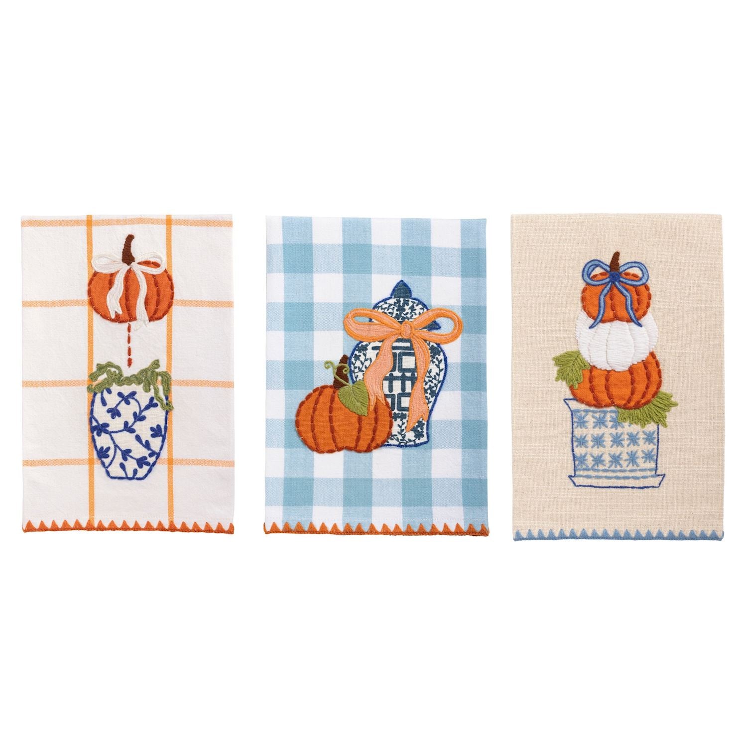 3 assorted fall towels on a white background