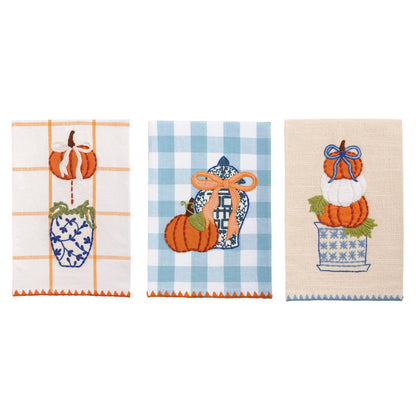 3 assorted fall towels on a white background