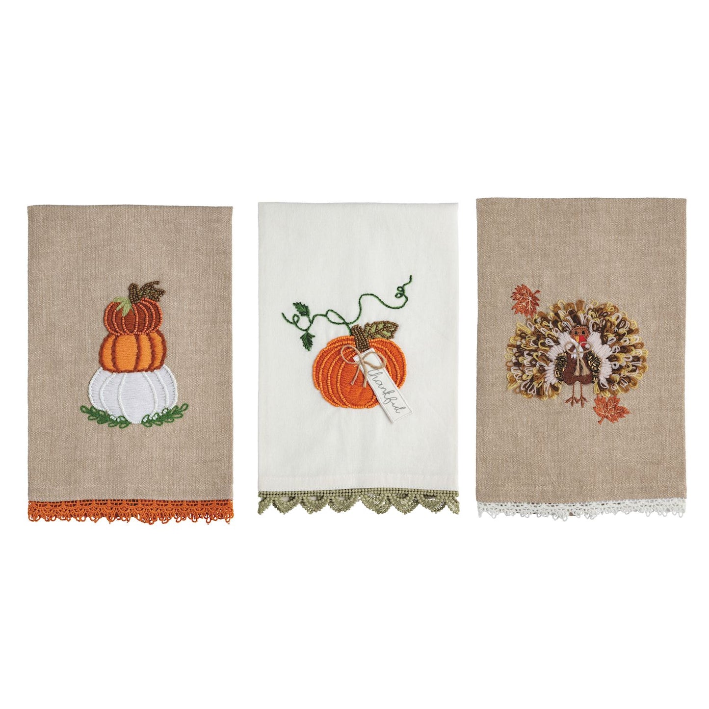 3 fall themed dishtowels in a row on a white background