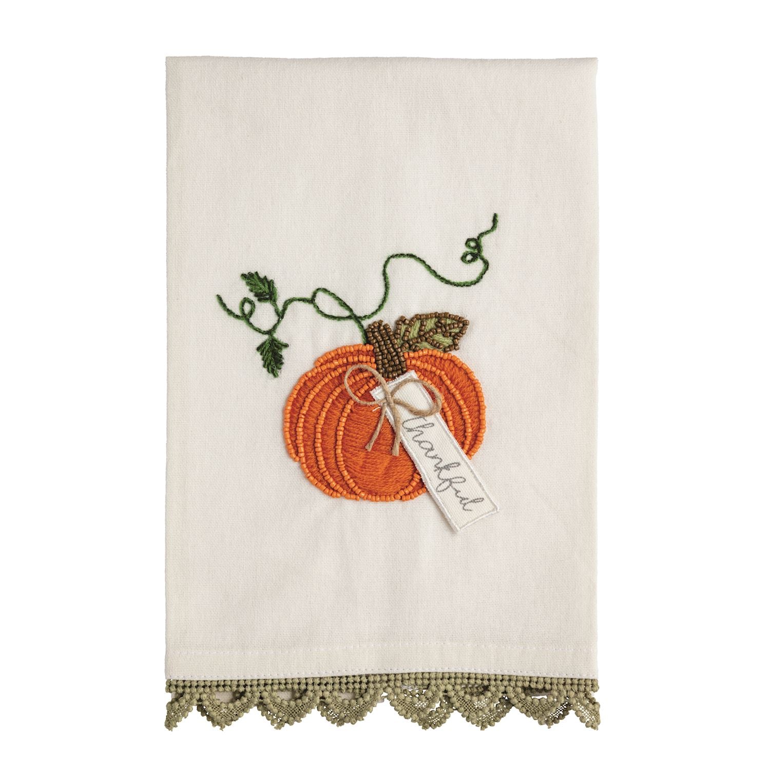 Decorative towel with embroidered pumpkin and leaf design on a white background