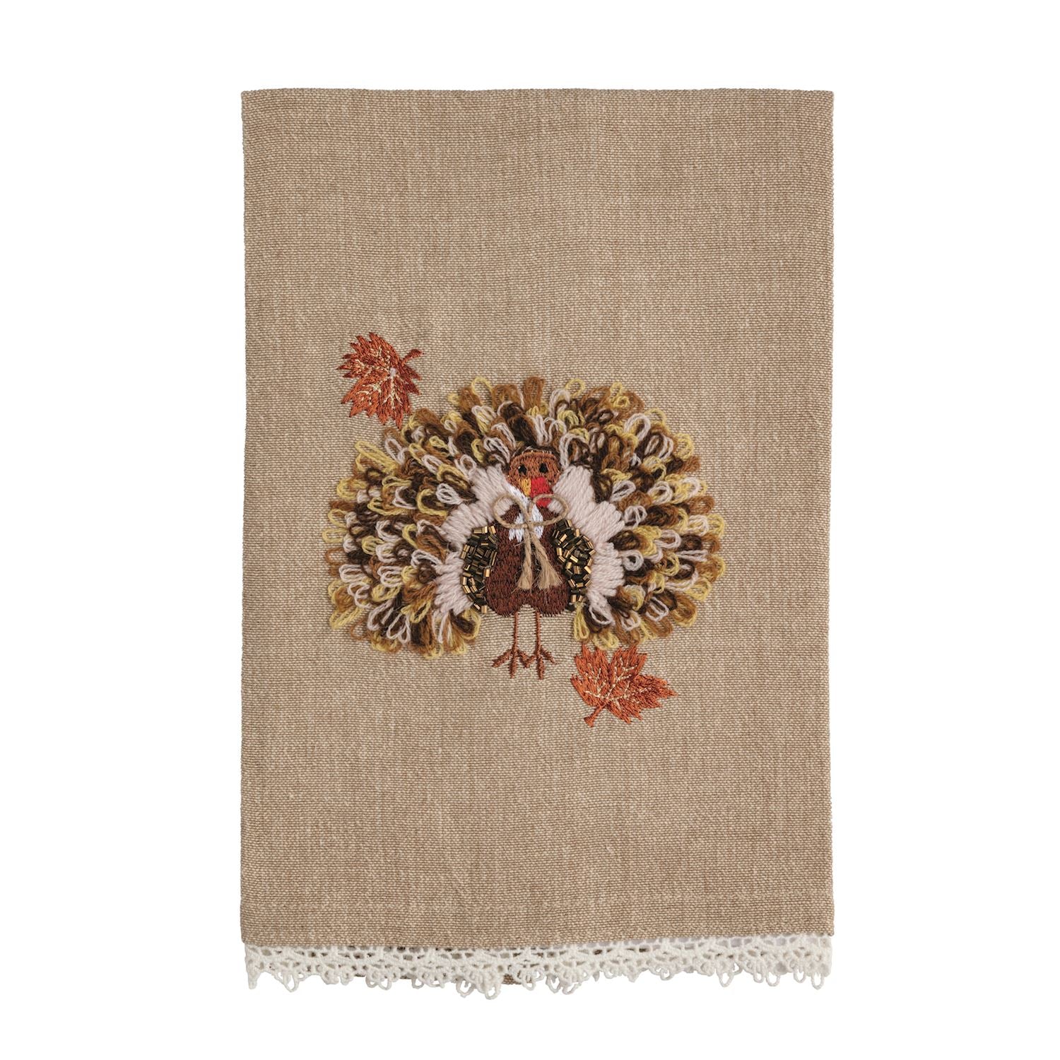 tea towel with a turkey design on a beige background