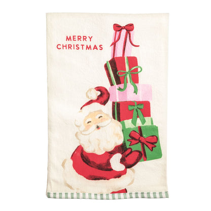 Whimsy Christmas Towel printed with playful image of santa holding a stack of gifts and 'merry christmas' at the top