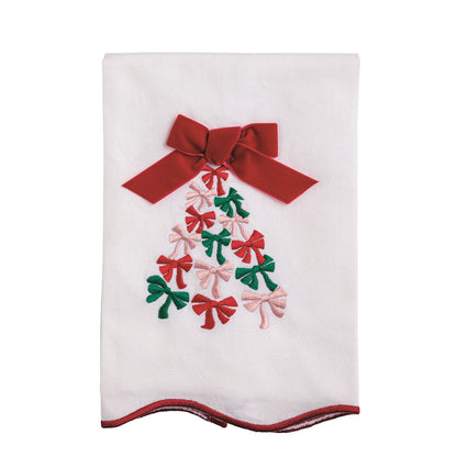 White towel with embroidered red, green, and pink bows and a red bow on top against a white background