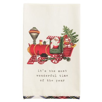 Christmas-themed towel with Santa Claus in a holiday train and 'it's the most wonderful time of the year' text.