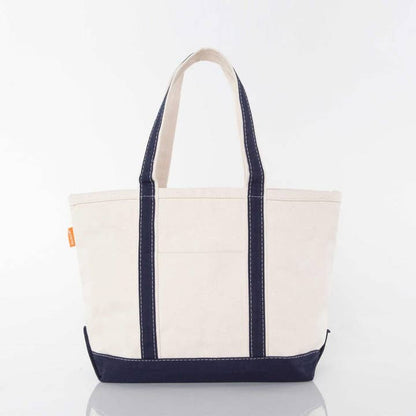 off white tote with navy blue trim and handles