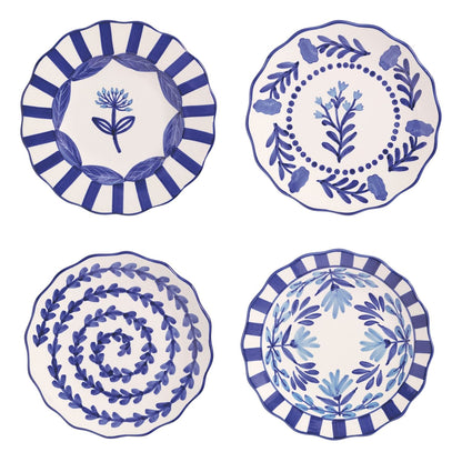 Four decorative plates with blue patterns on a white background