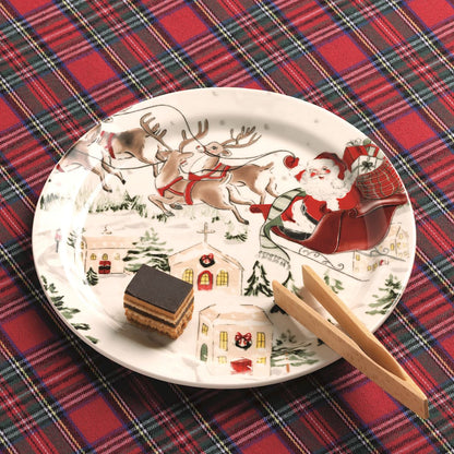 santa scene plate set on a tartan background