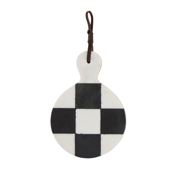 round black and white check marble board