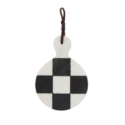 round black and white check marble board